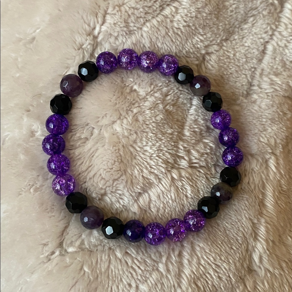 Purple beaded bracelet feat. High Quality Faceted Black crystal beads